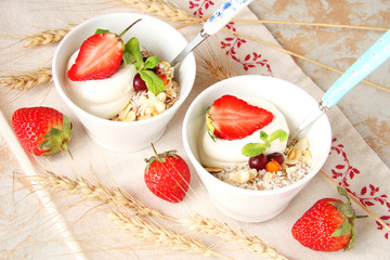 Cereal with grapes and strawberries, dried fruit, honey