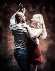 Young couple dances Caribbean Salsa