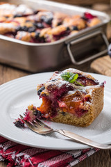 Yeast cake with plums and blueberries.