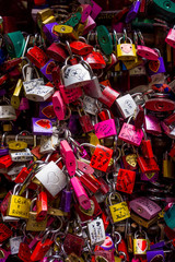 VERONA, ITALY - JUNE  02, 2014: Locks attachted to the wall of Juliets house in Verona as a proof of love