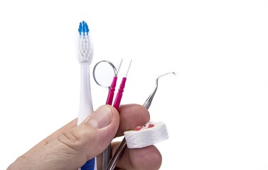 Dental tools with toothbrush interdental pick and floss