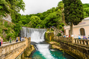 Fototapeta na wymiar NEW ATHOS, ABKHAZIA - JUNE 11, 2017:Dam waterfall in New Athos, Abkhazia