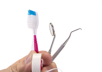 Dental tools with toothbrush interdental pick and floss