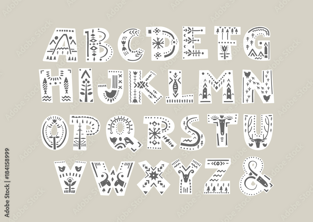 Wall mural vector bold white alphabet decorated with black nordic folk ornaments. display font.