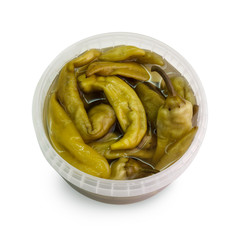 pepper spicy salty in an open plastic container, isolated on a white background