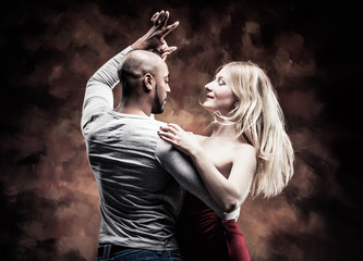 Young couple dances Caribbean Salsa