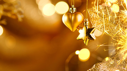 Christmas and New Year golden decorations. Abstract blinking holiday background