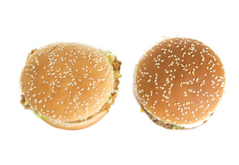 Top view of tasty hamburgers isolated on white background