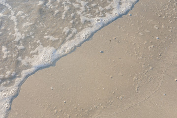 Wave on beach of southern Thailand.