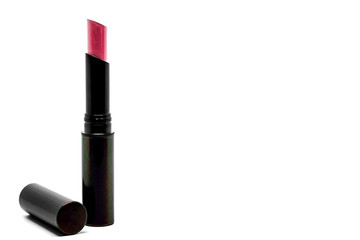 Obraz premium Red lipstick on the left side of the white background with copy space, beauty and cosmetic concept