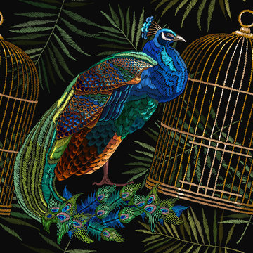 Embroidery peacocks and birds gold cage seamless pattern. Classical fashionable embroidery beautiful peacocks. Fashionable template for design of clothes. Tails of peacocks and birds cage