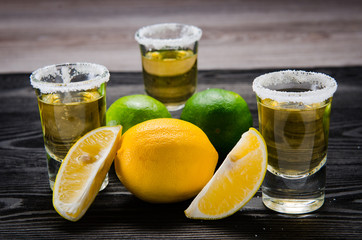 Tequila drink served in glasses with lime and salt