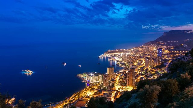 Aerial top view of Monaco from the grand corniche road day to night timelapse, Monaco France