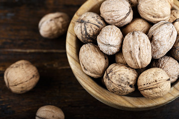 walnuts in a wooden plate
