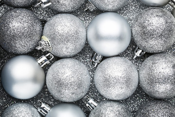 Silver christmas baubles background