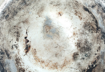 grunge and dirty metal texture from the bottom of old cooking pot