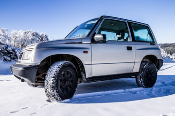 Old offroad car in the mountains