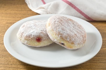 Two Delicious Donut Filled with Strawberry Jam