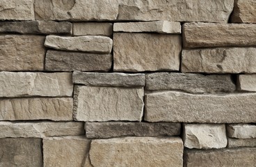Horizontal Texture of Brown Asymmetrical Stones Wall