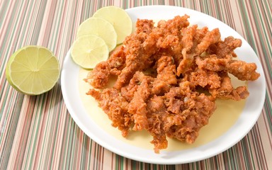 Thai Traditional Fried Chicken Skins on Dish