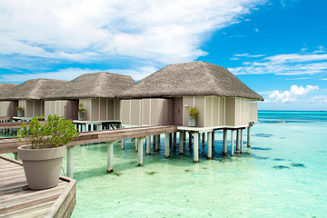 Wooden villas over water of the Indian Ocean, Maldives