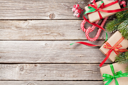 Christmas gift box, candy cane and fir tree