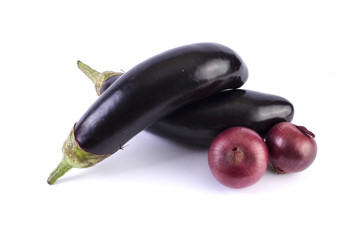 Eggplant with red onion on a white background. Aubergines are fresh and delicious.