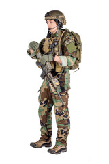 Portrait soldier or private military contractor holding sniper rifle.
