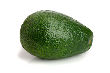 whole avocado isolated on white background close-up