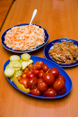canned tomatoes and zucchini on a plate