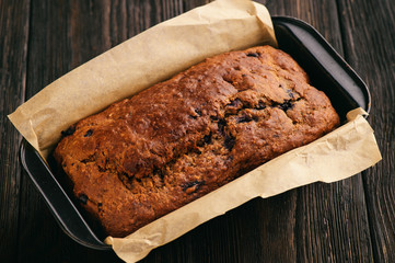 Homemade banana bread loaf with blueberries.