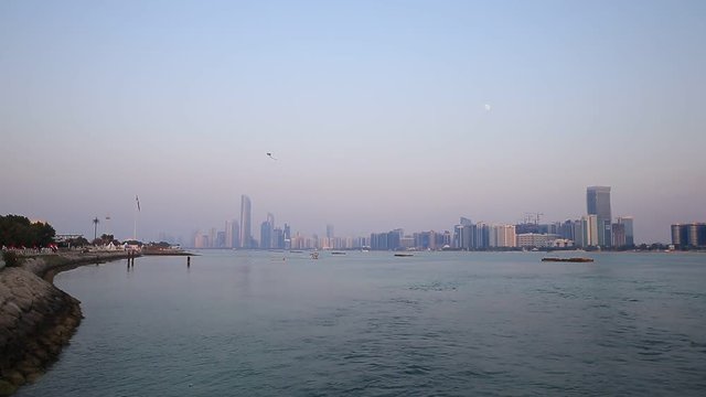 Abu Dhabi skyline during the day. Establishing shot.