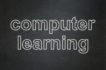 Fototapeta premium Education concept: text Computer Learning on Black chalkboard background