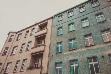vintage colored picture of green and orange buildings in berlin