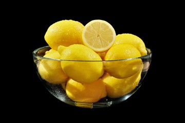 Fresh Lemons in a Glass Bowl