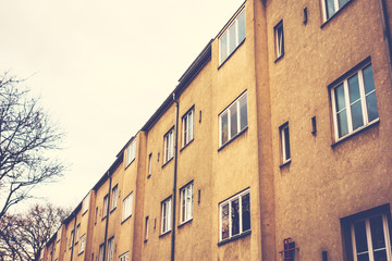 old gdr building with orange facade