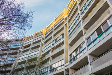 curved plattenbau building in low angle view