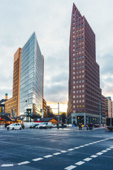 potsdamer platz at berlin with street and blurred cars and people