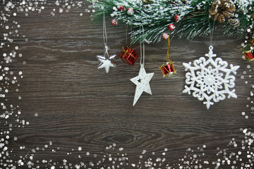 Christmas and New Year's composition. The pine cones, spruce branches on a wooden background