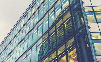 glass office building in low angle view