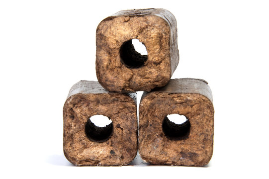 Renewable wooden briquettes for heating Alternative fuel eco fuel bio fuel.