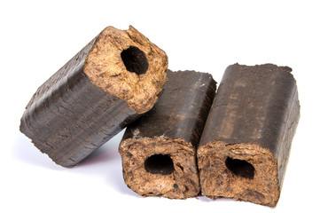 Renewable wooden briquettes for heating Alternative fuel eco fuel bio fuel.