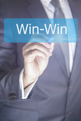 Businessman presses win-win collocation with marker. businessman touched win icon. Win win sign business concept, life, think, strategy, success, web, internet technology. 