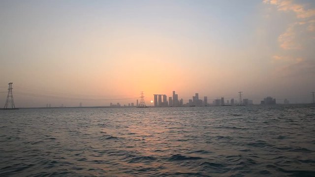 Sunset in Abu Dhabi, United Arab Emirates, view looking at Al Reem island