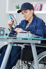 Disabled lady soldering