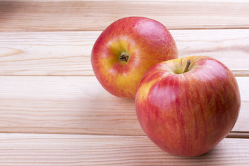 red apples closeup on a wooden background