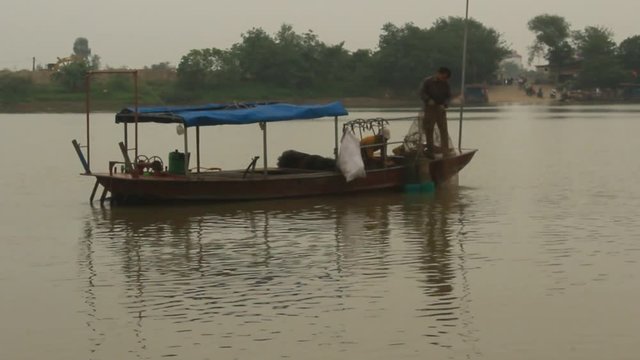 fishermen fishing on the river 