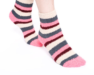 Multicolor women's fuzzy ankle socks with stripes isolated on white background