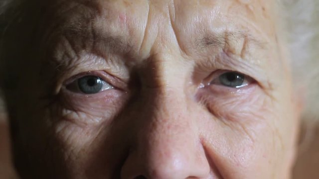 Eyes of an old woman crying