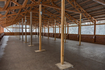 Fototapeta premium The abandoned unfinished wooden terrace of a summer cafe 